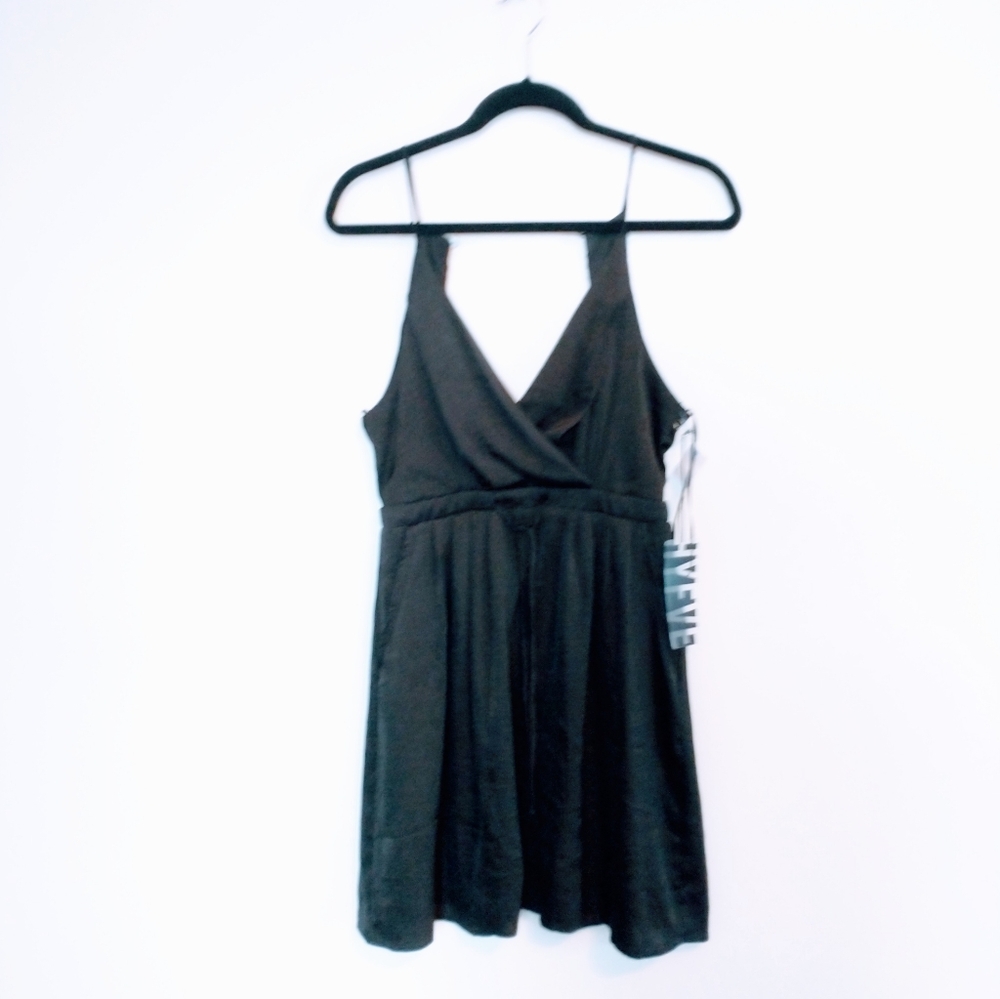 NWT Hyfve black dress with a drawstring at the waistband, size small. Has pocke